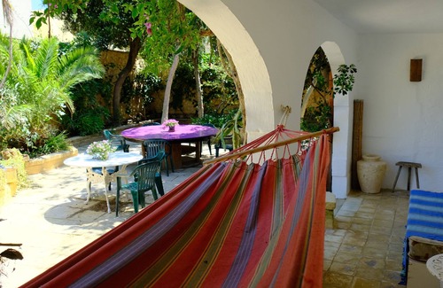 Gharb House | Enchanting converted farmhouse with private pool and mature garden with seaviews