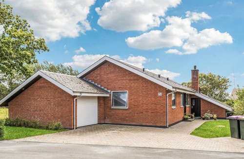 Hojer House | Enjoy a great view of the countryside from the terrace of this vacation home.