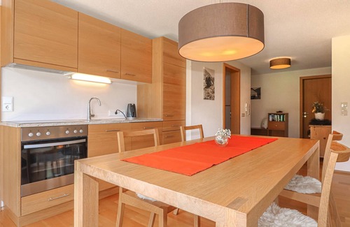 Bizau Apartment | Enjoy a lovely break close to nature in this holiday apartment with access to a pool and sauna.