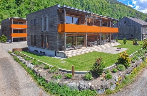 Bizau Apartment | Enjoy a lovely break close to nature in this holiday apartment with access to a pool and sauna.