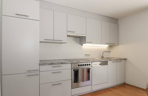 Bizau Apartment | Enjoy a lovely break close to nature in this holiday apartment with access to a pool and sauna.