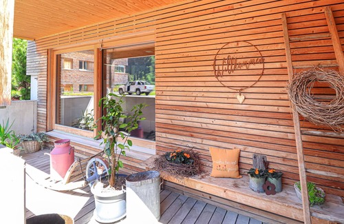 Bizau Apartment | Enjoy a lovely break close to nature in this holiday apartment with access to a pool and sauna.