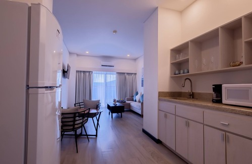 San Pedro Hotel | Enjoy a spacious signature two-bedroom suite with a beach view!