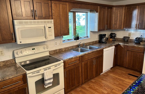 Averill Park House | Enjoy a spectacular view of Burden Lake, NY while relaxing inside or outside.
