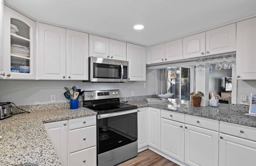 Folly Field Villa | Enjoy a walk to the beach from this renovated, pet friendly end-unit villa.