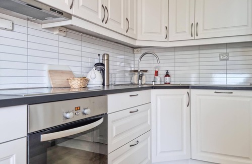 Farsund Apartment | Enjoy a wonderful vacation in this beachfront apartment with pool access.