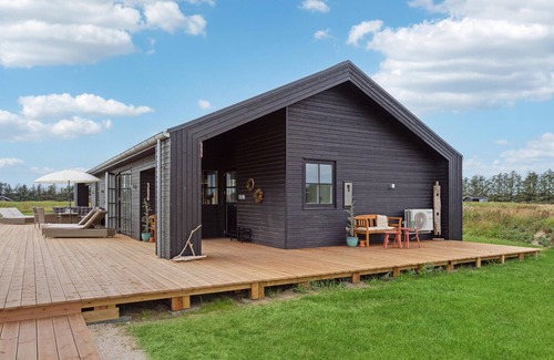 Grønhøj House | Enjoy an unforgettable vacation near the sea in this vacation home.