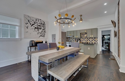Inman Park Apartment | Enjoy both units of this stylish 5BR/5BA Inman Park duplex—perfect for families, business travelers, and groups. Walkable to top restaurants and the BeltLine. Features 2 kitchens, 3 fireplaces, front porch, pool table & private patios.