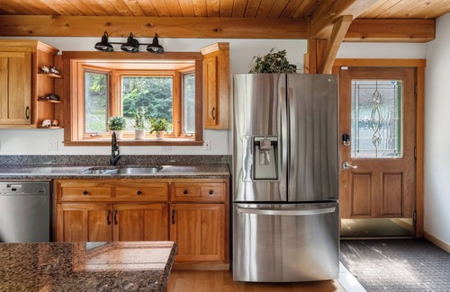 Lower Village House | Enjoy fall foliage from the hot tub!
