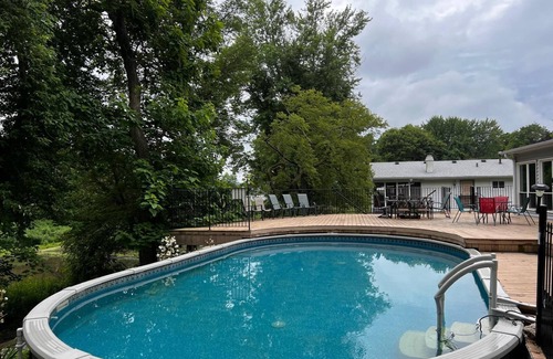 East Moline House | Enjoy Florida in Illinois; House on Island with Pool