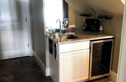 Port Douglass House | Enjoy Modern Amenities and Fun on the Water with Kayaks & Paddle Boat