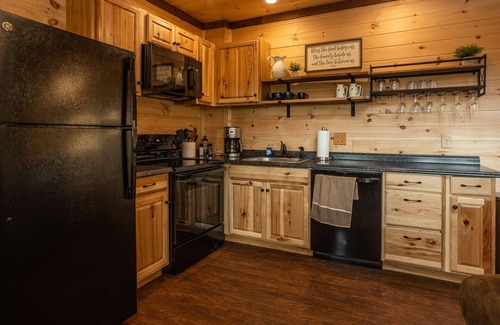 Bristol Cabin | Enjoy Mtn/River Views from Osprey Cabin, porch fireplace, 500ft river frontage