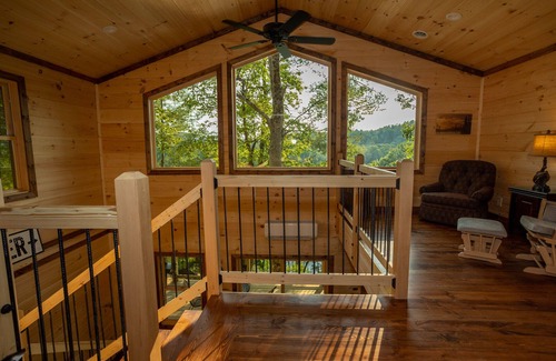 Bristol Cabin | Enjoy Mtn/River Views from Osprey Cabin, porch fireplace, 500ft river frontage