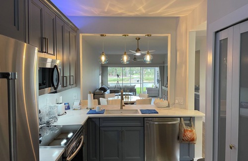 Lely Golf Estates Condo | Enjoy stunning lake & golf views from this renovated 2/2 ground flr corner condo