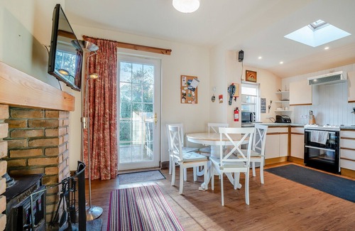 Corrie Cottage | Enjoy stunning sea views from this traditional cottage on the coast of Arran.