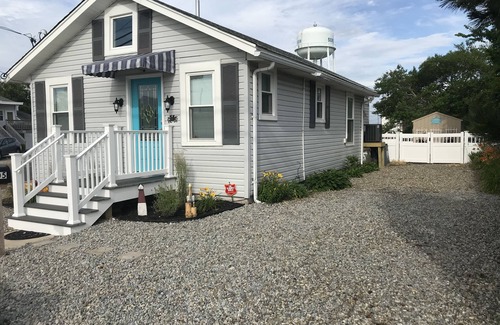 Ortley Beach House | Enjoy sunsets at this modern cottage with large backyard and peekaboo bay view.