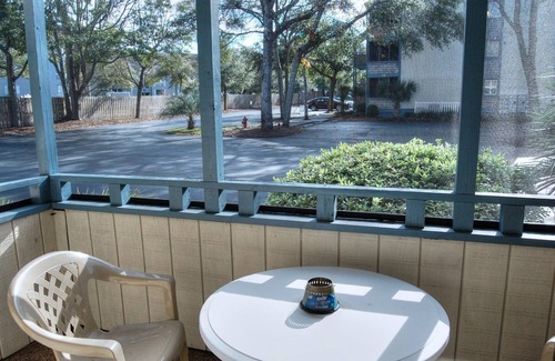 Myrtle Beach Condo | Enjoy the breeze from the screened in porch on summer nights - Summertree F2