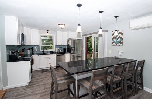Saunderstown House | Enjoy the deck with pond view! Great Location, Rt 1A. 4 BR-all Queens, 2.5 Bath