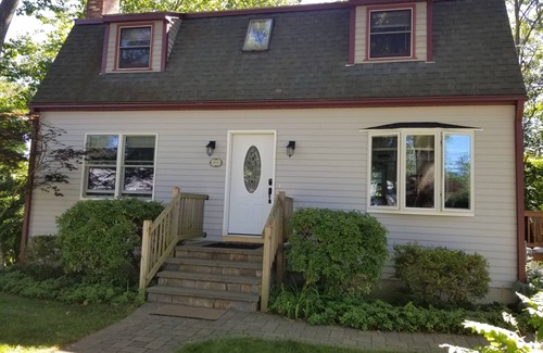 Saunderstown House | Enjoy the deck with pond view! Great Location, Rt 1A. 4 BR-all Queens, 2.5 Bath