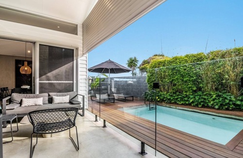 Lennox Head Apartment | Enjoy the deluxe swimming pool surrounded by a poolside sundeck