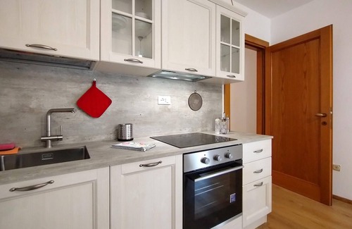 Venegazzu House | Enjoy the view of beautiful vineyards from this semi-detached house.