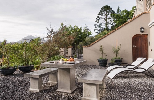 Stellenbosch Apartment | Enjoy the privacy of your own wood fired hot-tub, barbecue & breathtaking views.
