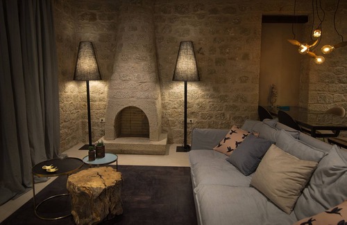 Stoupa Villa | Enjoy the relaxation of chic seaside living in a sea view stone villa