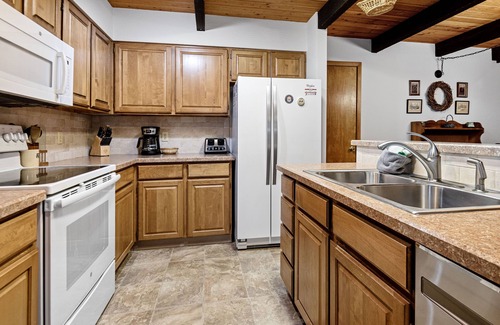 Tennis Village Condo | Enjoy the Sauna and 6 Unlimited SHARC Passes with Great Location!