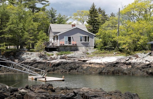 Five Islands House | Enjoy the stunning views while relaxing on the deck at East Ledge Cottage