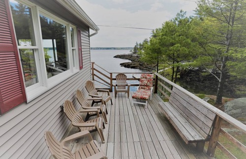 Five Islands House | Enjoy the stunning views while relaxing on the deck at East Ledge Cottage