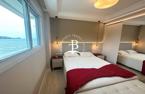 Itapema Apartment | Enjoy the sunset and relax in a heated pool