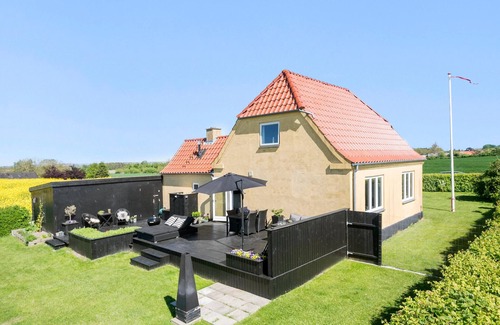Korsor House | Enjoy the tranquillity of nature in this vacation home, nestled in an idyllic landscape.