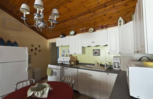 Shipshewana House | Enjoy the view from relaxing deck overlooking the lake. Water fun and sun.