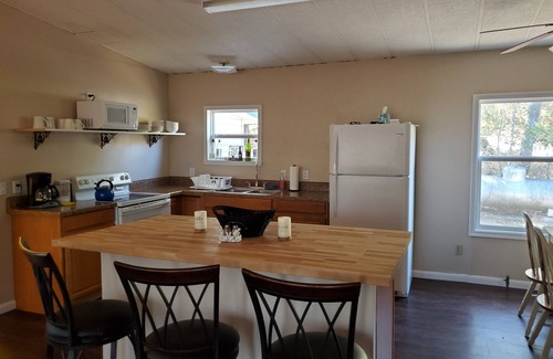 Chico House | Enjoy your Getaway to this 3br 2ba Lakefront Home with Dock and boat slip
