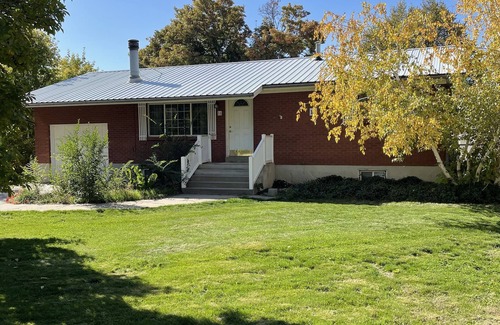 Willard House | Entire Home! Nestled between towering mountains and a family friendly lake.