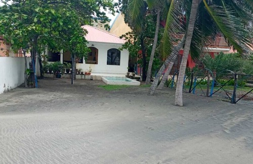 Poneloya House | Entire house, right on the beach, with a small pool.
