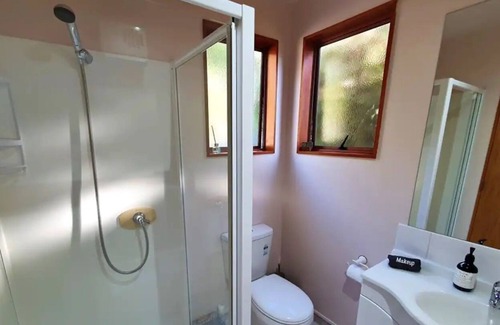 Whatamango Bay Cottage | Epic view Whatamango Bay waterfront cottage