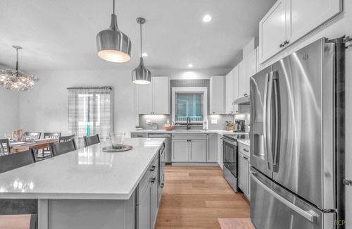 Rockaway Beach House | Escape to a cozy, modern lake house with beautiful Oregon views.