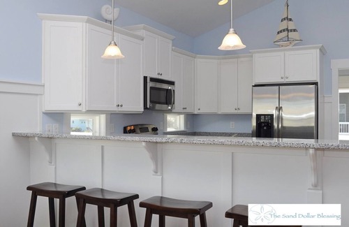 Surf City House | Escape to great views of the ocean & sound in this sun soaked reverse plan home