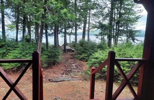 Willimantic Cabin | Escape to Howie's Camp: Unwind and Recharge at This Lakefront Log Cabin