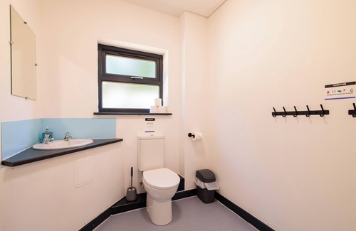 Brayford Cabin | Escape to nature - stunning group lodges overlooking Wistlandpound Reservoir
