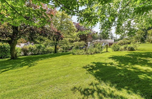Cowbridge Cottage | Escape to rustic charm and relaxation at this one-bedroom log cabin near Cowbridge.
