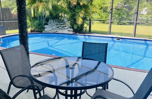 Fort Myers Shores House | Escape to Sunshine Bliss: Unwind in our Stunning Retreat! With heated pool!