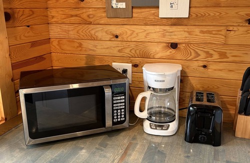 Winamac Cabin | Escape to The Riverside Hideaway - A Cozy Cabin With River Views!