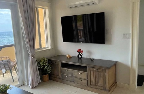Point Blanche Apartment | Escape to Tranquility 2-bedroom modern home at waterfront with fast Internet.