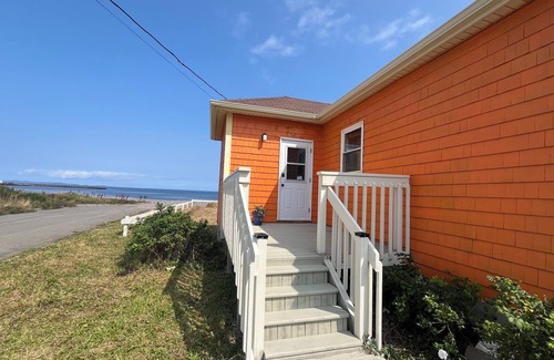 Grand Bank House | Escape to your private oasis in our ocean front home with breathtaking views.