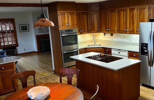 Cambridge House | Escape with family or friends to this peaceful, 4-bedroom retreat on the water