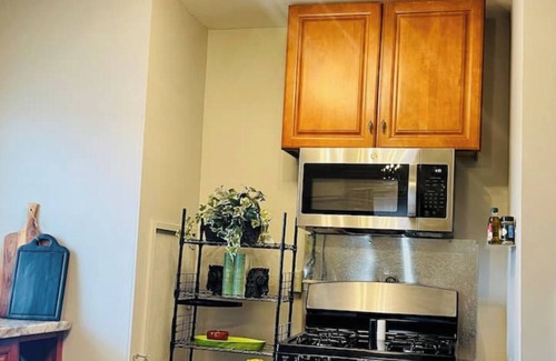Huntington Apartment | Espresso Maker & Modern Decor by Arena, University, Hospitals