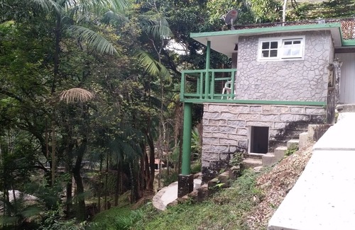 Itatiaia Ski Chalet | Estalagem do Rancho: Chalet with waterfalls