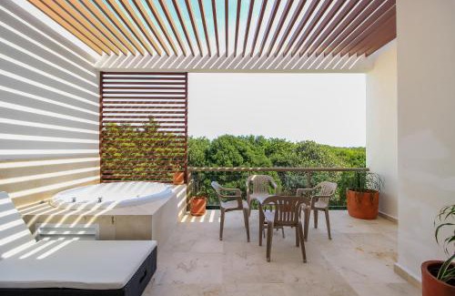 Akumal Apartment | Exceptional 2Story Penthouse with Hot Tub and Rooftop Terrace in Bahia Principe